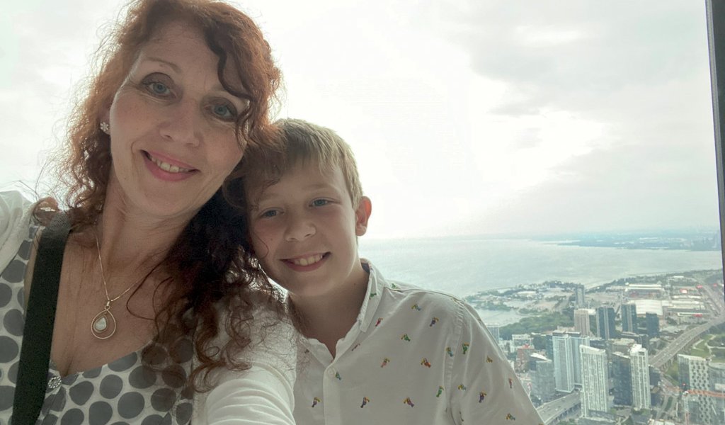 The intrepid duo on top of the CN Tower in Toronto, Canada.