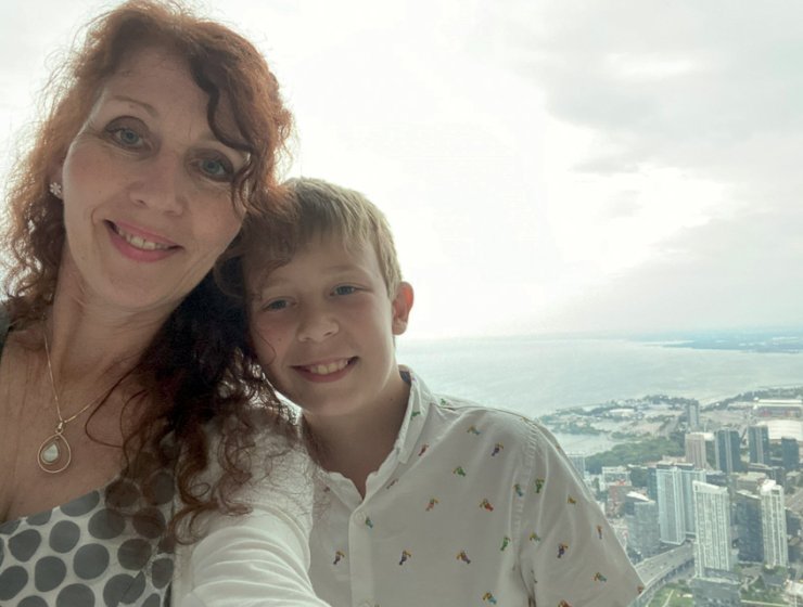The intrepid duo on top of the CN Tower in Toronto, Canada.
