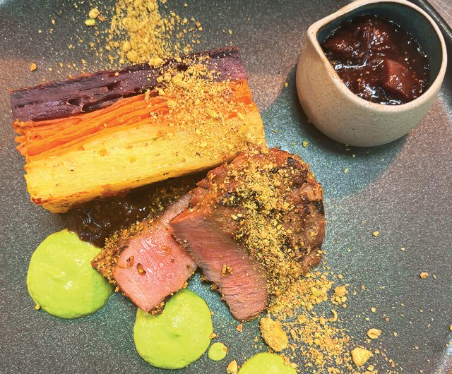 Pistachio Dukka Spiced Lamb served with goat’s cheese heritage potato terrine, fig sauce and broccoli puree (GF)