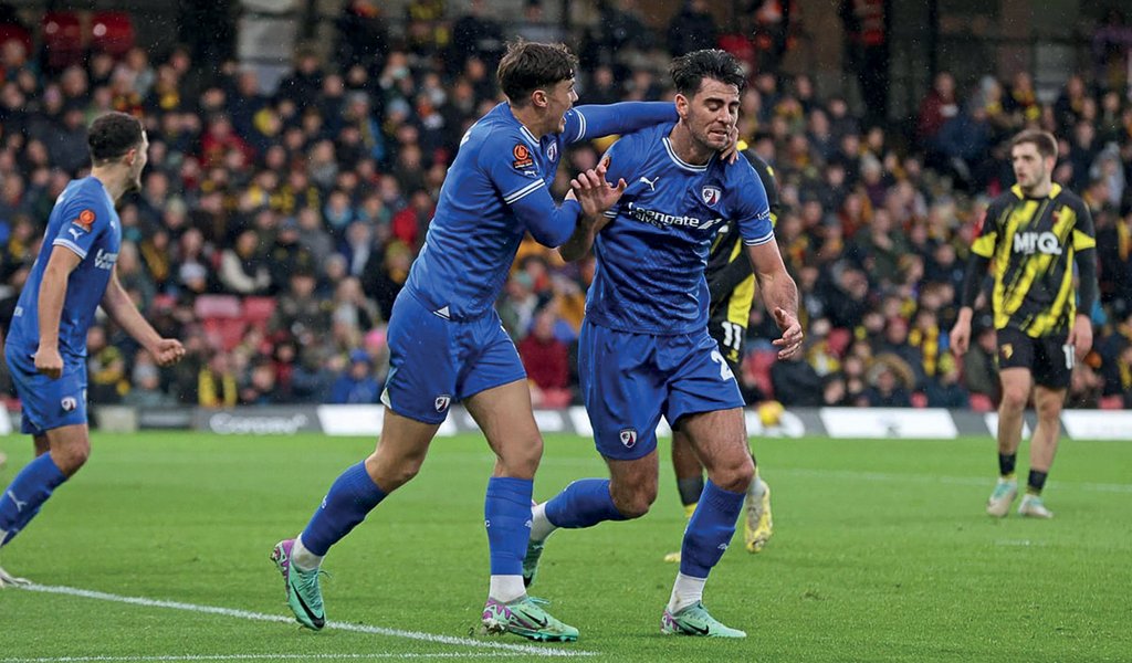 Joe Quigley celebrates the opening goal against Watford in the FA Cup