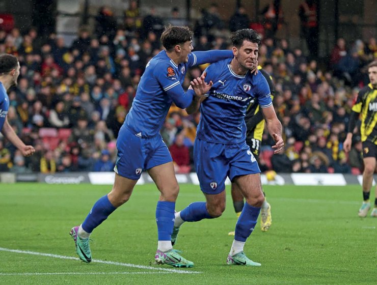 Joe Quigley celebrates the opening goal against Watford in the FA Cup