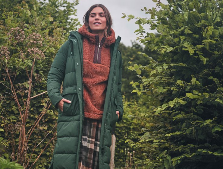 Harley Long Puffer Coat,  £170, Millie Overhead Fleece, £65, and Ceil Check Dress, £69, all FatFace. www.fatface.com