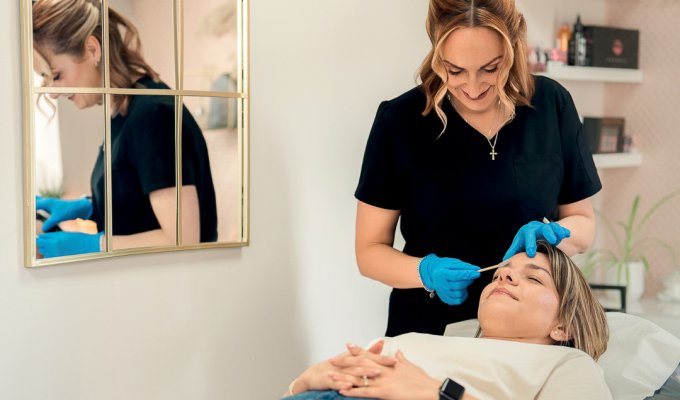 Carly works on an eyebrow treatment. Picture by Helen Rowan Photography