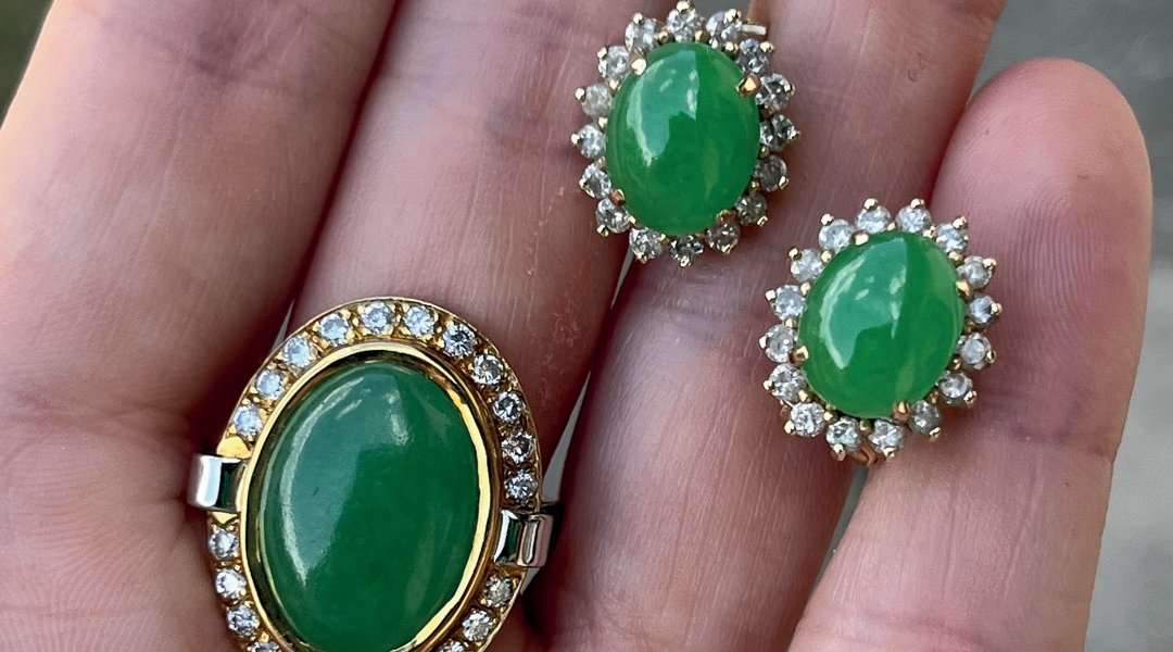 Jade and diamond ring and a pair of earrings, set with an oval jade cabochon, and brilliant cut diamonds. These had an estimate of £400-500 but made over three times more, selling for £1,600.