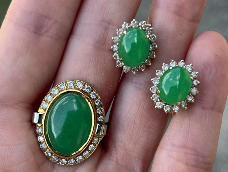 Jade and diamond ring and a pair of earrings, set with an oval jade cabochon, and brilliant cut diamonds. These had an estimate of £400-500 but made over three times more, selling for £1,600.