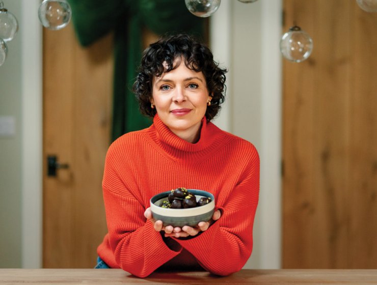 A tasty - yet healthy - treat. Jo Bibby with a bowl of hazelnut energy bites. Picture: Helen Rowan Photography