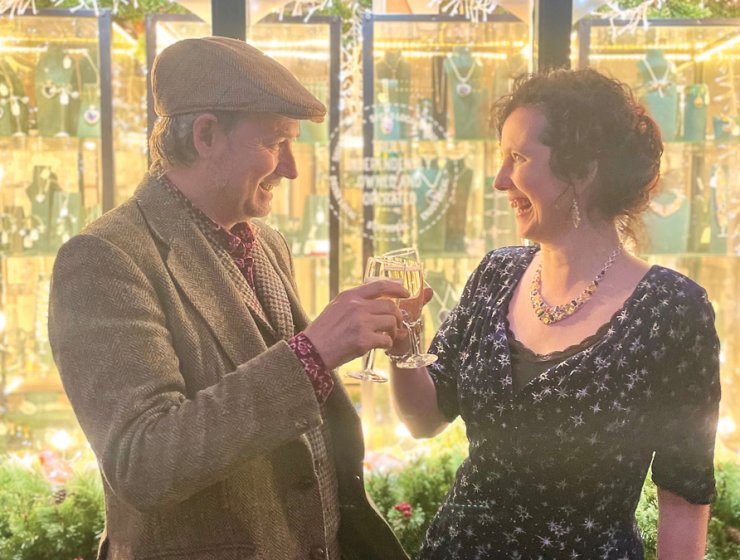 Laura Jo and Adam raise a toast outside Adorn on the evening of the party. Picture: Fiona Stubbs