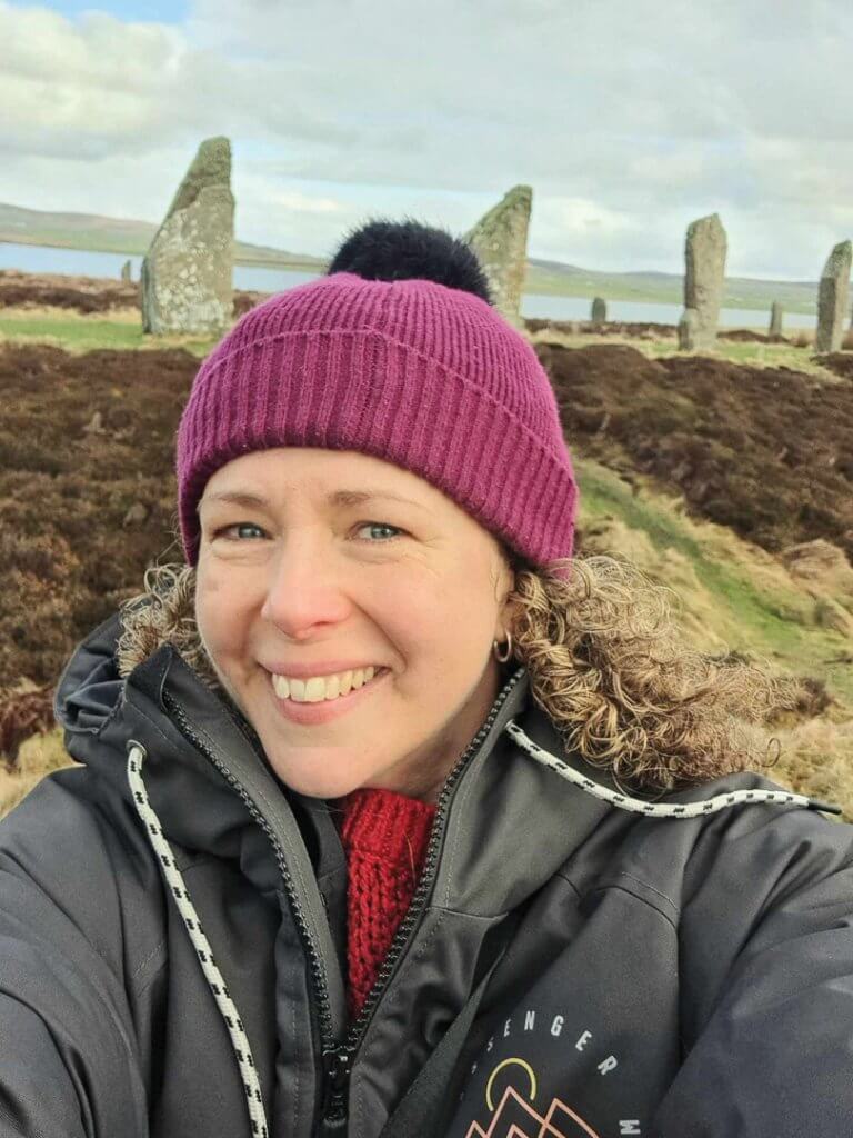 Anna at the Ring of Brodgar stone circle in Orkney