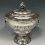 Portuguese silver pedestal bowl and cover, dating from the 1900s, with embossed decoration and gilt interior, 21cm high. It made £1,950 at auction - at the time of selling this was more than the scrap metal value.