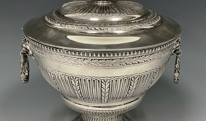 Portuguese silver pedestal bowl and cover, dating from the 1900s, with embossed decoration and gilt interior, 21cm high. It made £1,950 at auction - at the time of selling this was more than the scrap metal value.