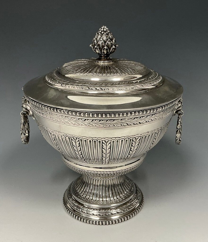 Portuguese silver pedestal bowl and cover, dating from the 1900s, with embossed decoration and gilt interior, 21cm high. It made £1,950 at auction - at the time of selling this was more than the scrap metal value.