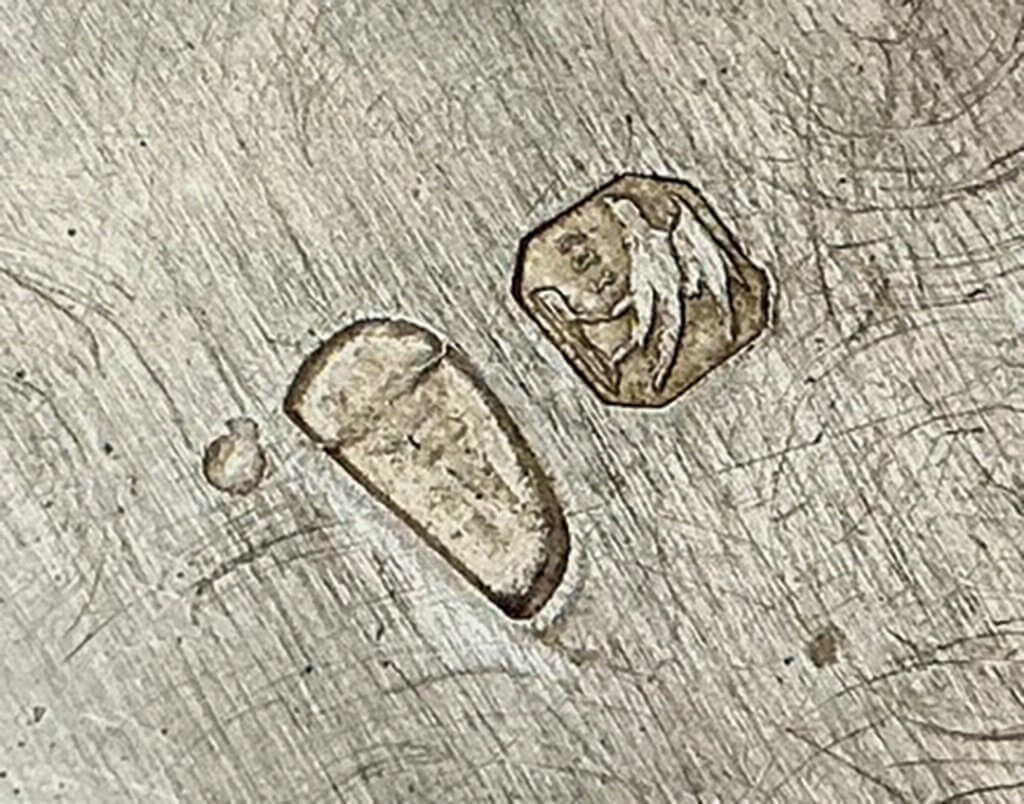 Portuguese silver pedestal bowl and cover, dating from the 1900s, with embossed decoration and gilt interior, 21cm high. It made £1,950 at auction - at the time of selling this was more than the scrap metal value.