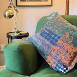 One of Sara’s designs adorns a cushion in the sitting room of her Peak District cottage