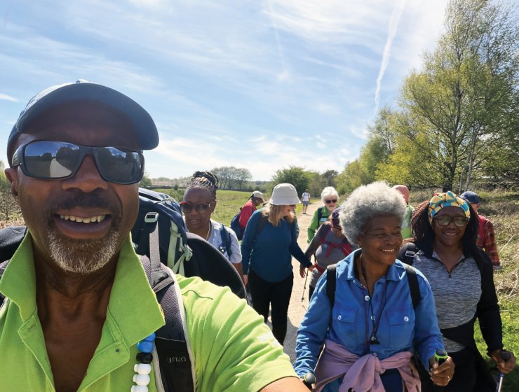 Godfrey Francis leads a walk as part of the anniversary celebrations