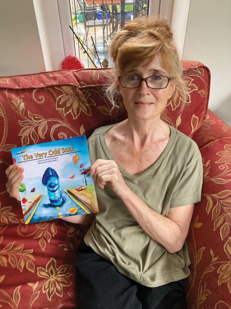 Allison with her book, The Very Odd Sock
