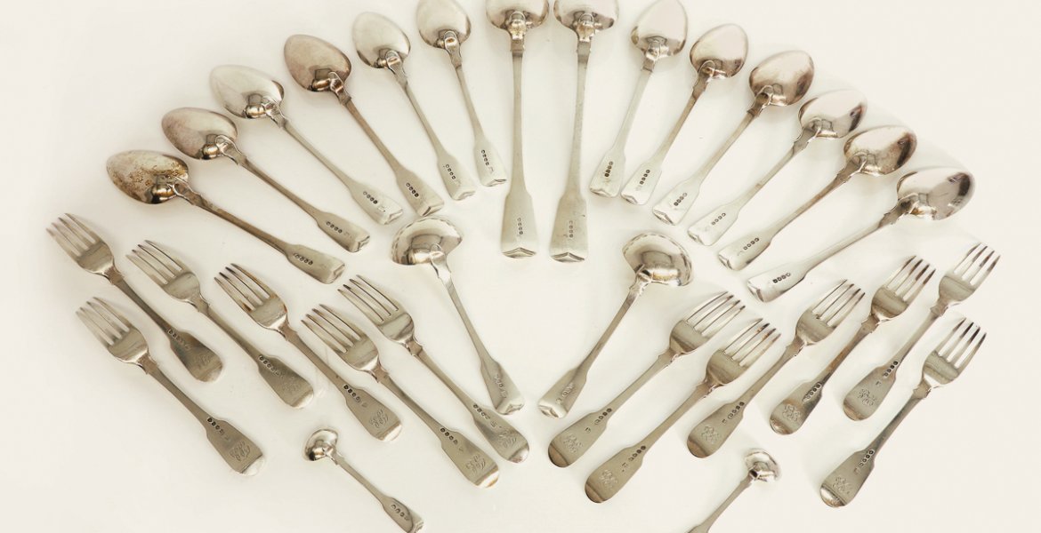 George III silver fiddle pattern set of cutlery, by William Eley, William Fearn and William Chawner, London, 1812, 60oz total. It made £3,300 in a recent specialist auction.