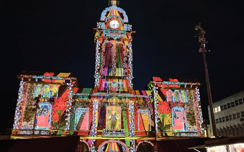 People watch the light show