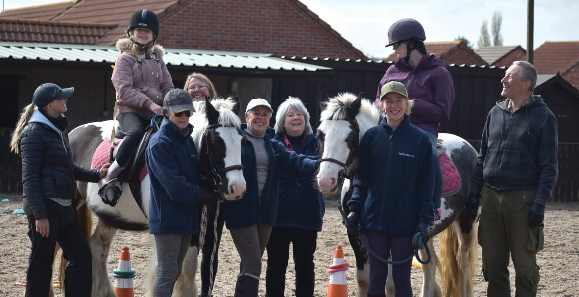 Maggie and Amy with Mid Derbyshire Riding for the Disabled volunteers. Picture: Fiona Stubbs