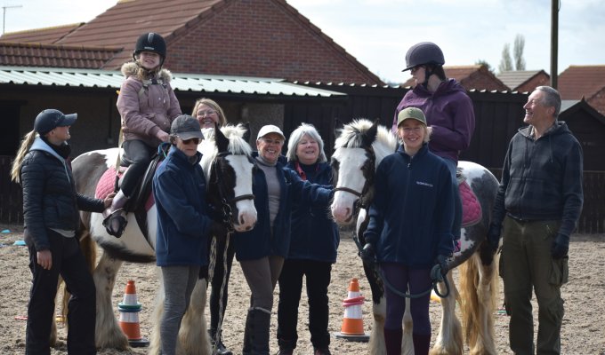 Maggie and Amy with Mid Derbyshire Riding for the Disabled volunteers. Picture: Fiona Stubbs