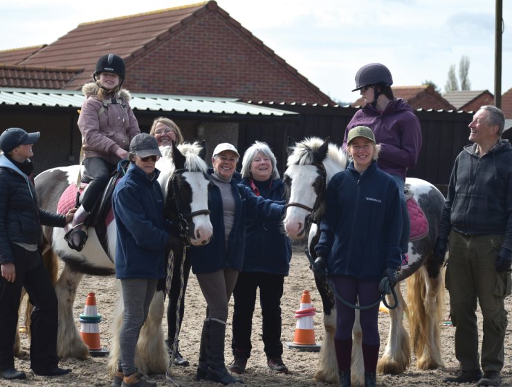 Maggie and Amy with Mid Derbyshire Riding for the Disabled volunteers. Picture: Fiona Stubbs