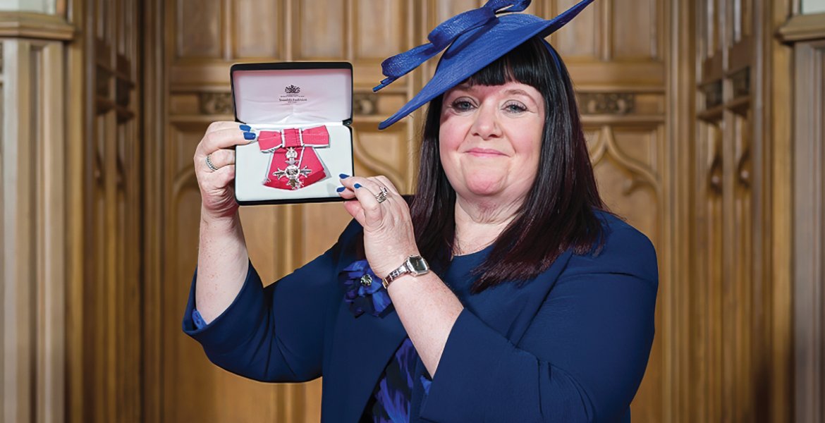 Lisa with her MBE