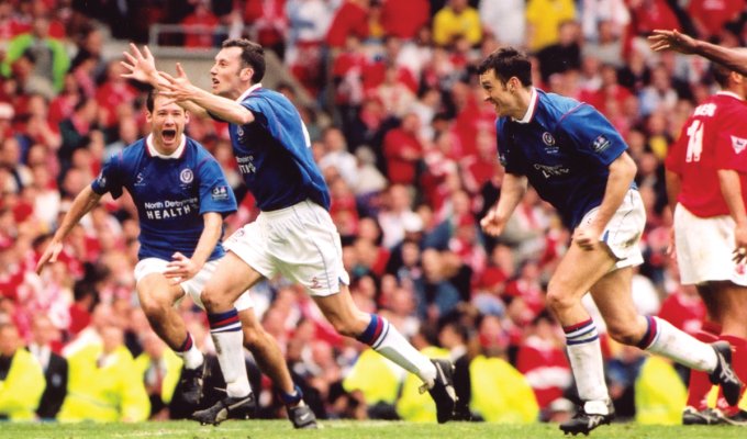 Jamie Hewitt celebrates his last-gasp equaliser against Middlesbrough at Old Trafford alongside Chesterfield teammates Jonathan Howard and Darren Carr. Picture: Chesterfield Football Club