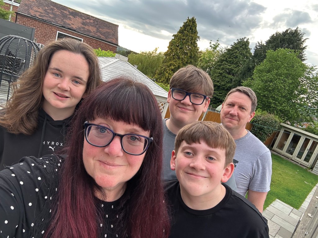 Lisa with her family at home