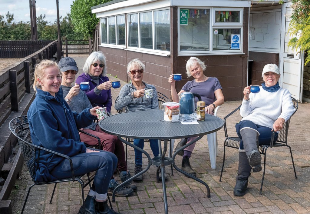 Team members of Mid Derbyshire Riding for the Disabled at Poplar Farm Equestrian stables in Duckmanton