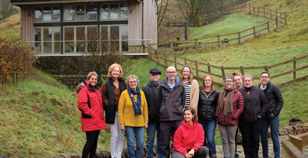 Nora (front) with a group during a Spanish retreat in the Peak District