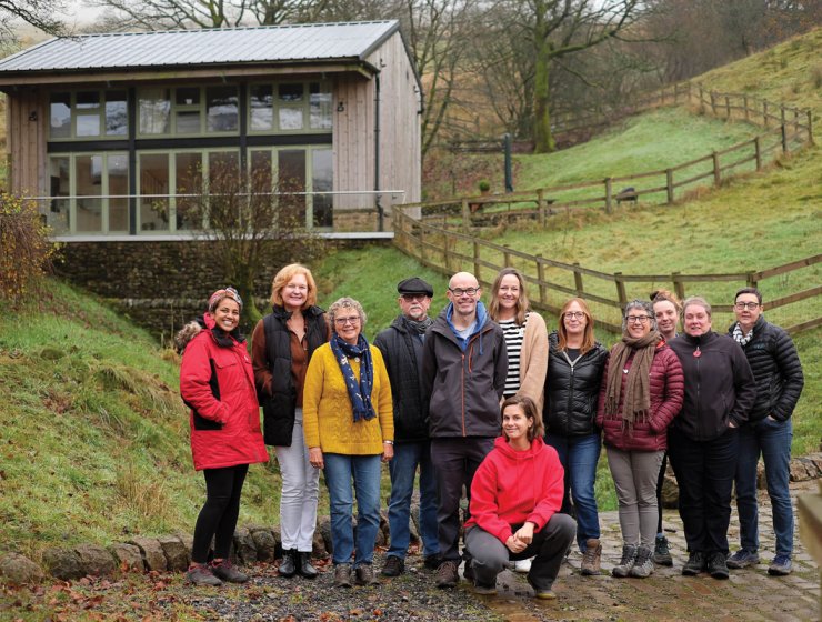 Nora (front) with a group during a Spanish retreat in the Peak District