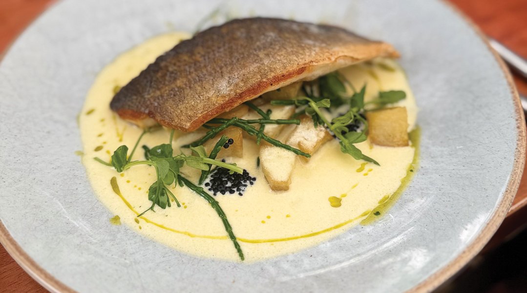 Pan fried seabass fillet, parmentier potatoes, samphire & caviar with a white wine beurre blanc