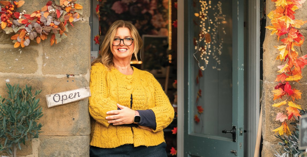 Anne Hyde in the seasonally dressed doorway of The Bothy. Picture: Helen Rowan Photography